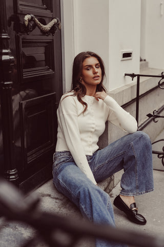 Stretch top met drukknoopjes creme - Florine