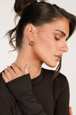Oorpiercing cross met steentjes goud - Megan