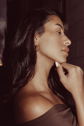 Halve oorringen goud met ribbels - Alara