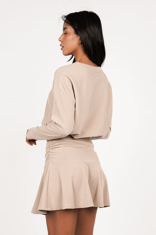 Jurk met ribstof en ruffle beige - Nanna