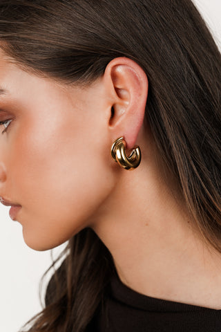 Oorbellen rond met gedraaid effect goud - Sofa