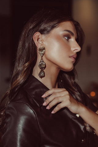 Statement blad oorbellen goud - Fenna