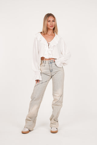 Witte blouse met ruffles en strikjes - Peggy