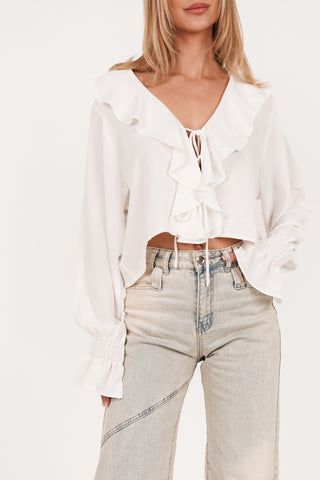 Witte blouse met ruffles en strikjes - Peggy